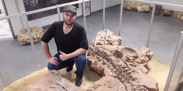 Rick Tolchard studying rauisuchians in the Geological Survey in Namibia. Photo credit: Helke Mocke